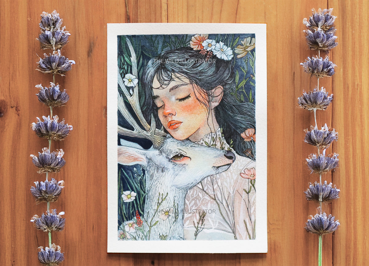 A mystical watercolor painting of a woman and a white deer, surrounded by wildflowers and foliage, symbolizing harmony with nature.